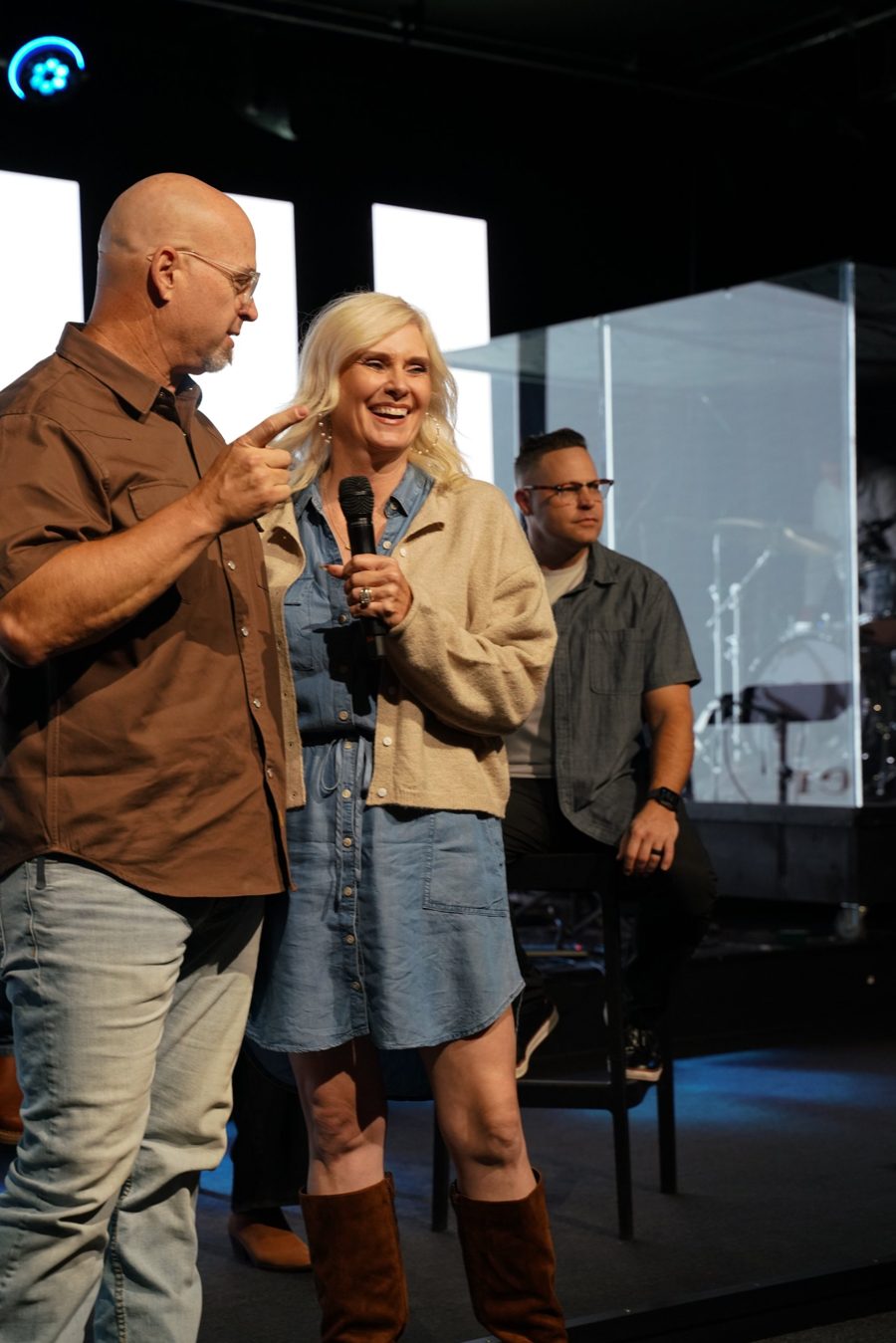 Dave and Brooke laughing together on stage